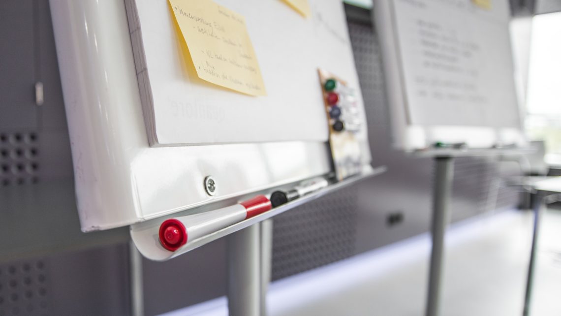 dry erase board with sticky notes and dry erase markers for effective EHS Powerpoint Presentations