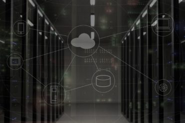 A row of servers with a cloud signifying network and cloud based services contributing to ISO 14001